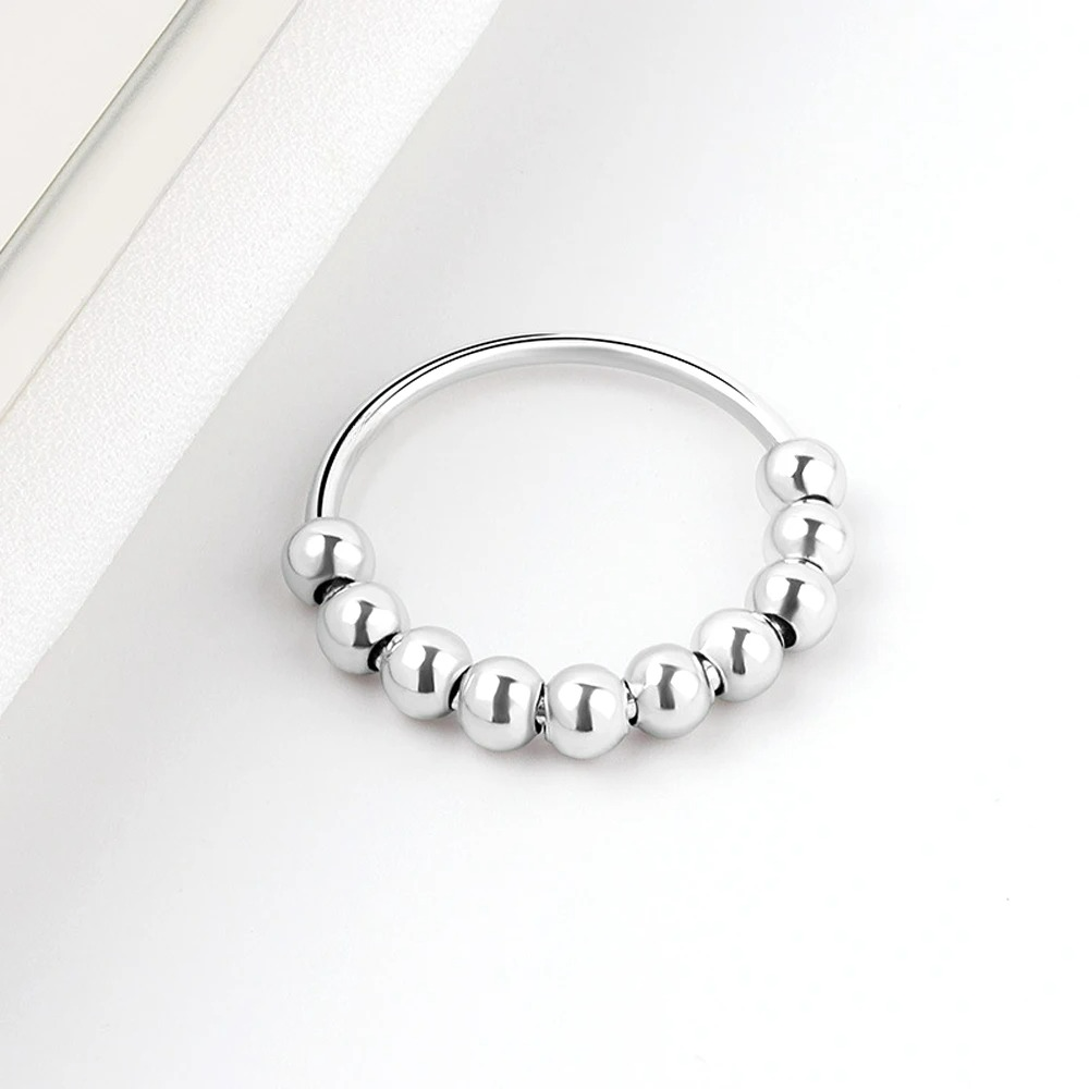 Anillo Antiestrés con Perlas Giratorias para Hombre o Mujer plata