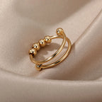 Anillo Antiestrés con Perlas Giratorias oro