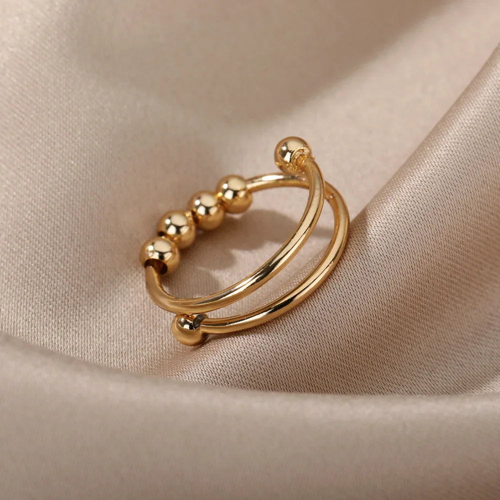 Anillo Antiestrés con Perlas Giratorias oro
