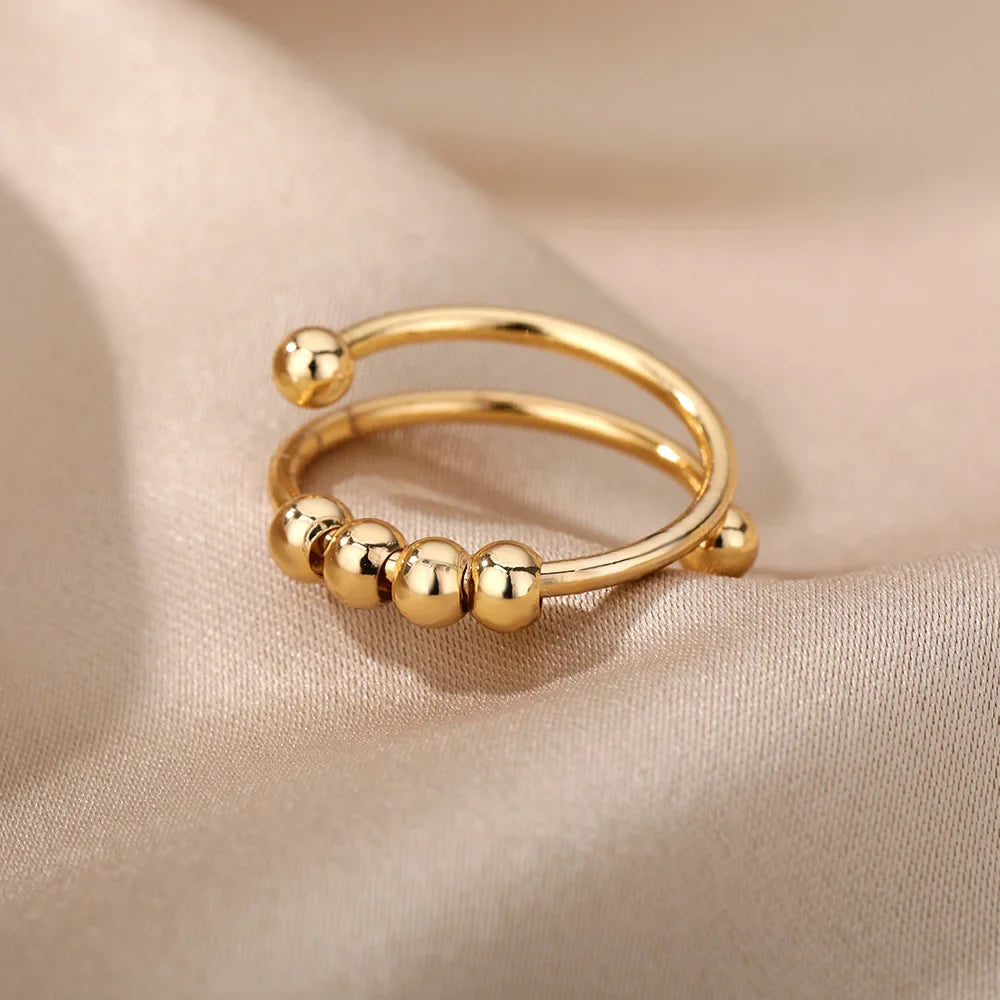 Anillo Antiestrés con Perlas Giratorias oro