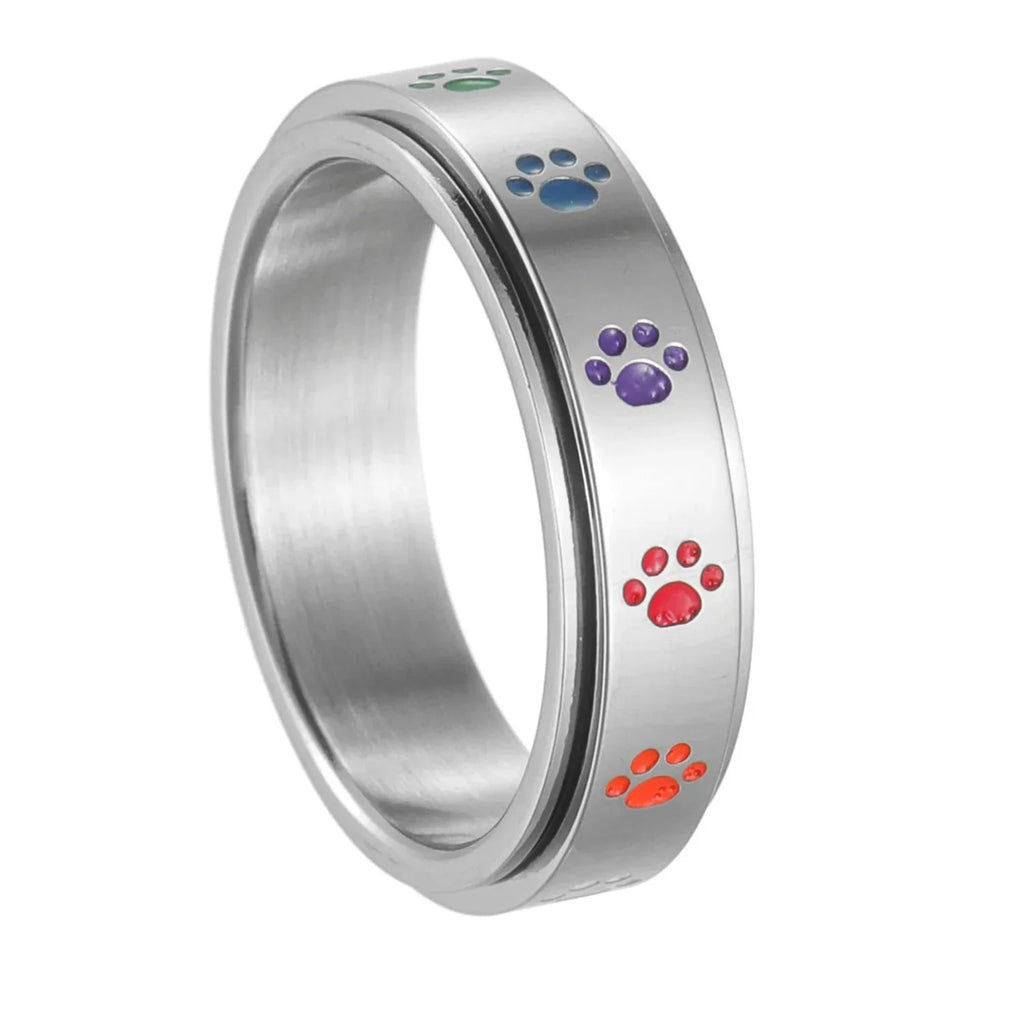 Anillo con corazones o patas antiestrés giratorio patas