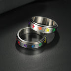 Anillo con corazones o patas antiestrés giratorio corazón
