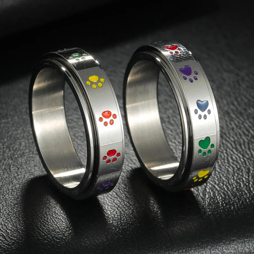 Anillo con corazones o patas antiestrés giratorio patas
