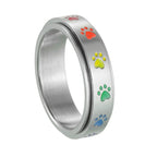 Anillo con corazones o patas antiestrés giratorio patas