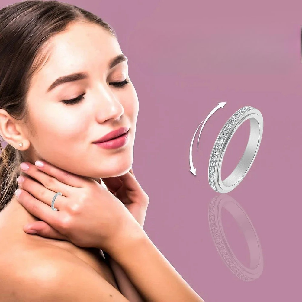 Anillo Giratorio Antiestrés con Circonio plateado