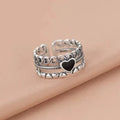 Anillo Plateado Corazón Negro Mujer