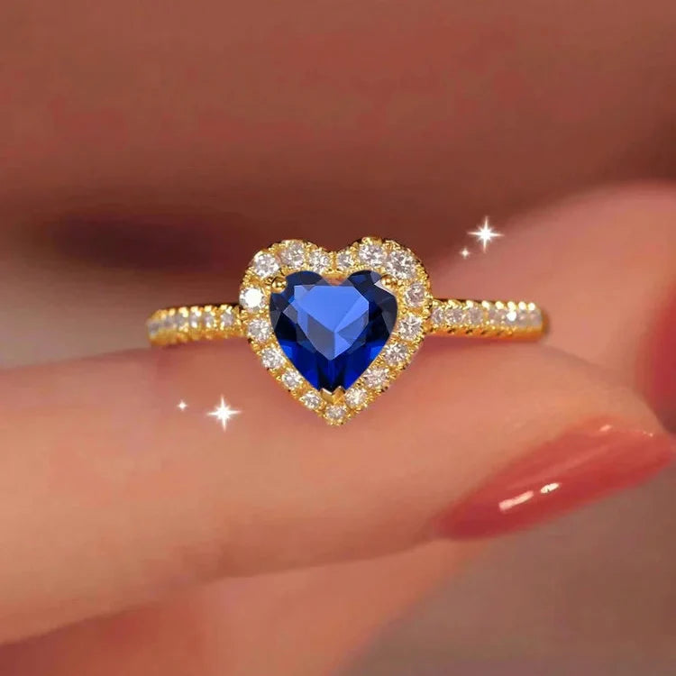Anillo con Corazón y Circonita azul y oro