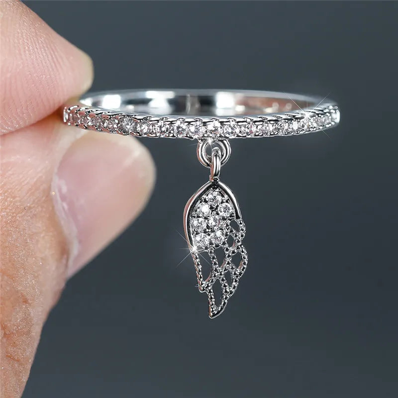 Bague avec pendentif ailes d'ange