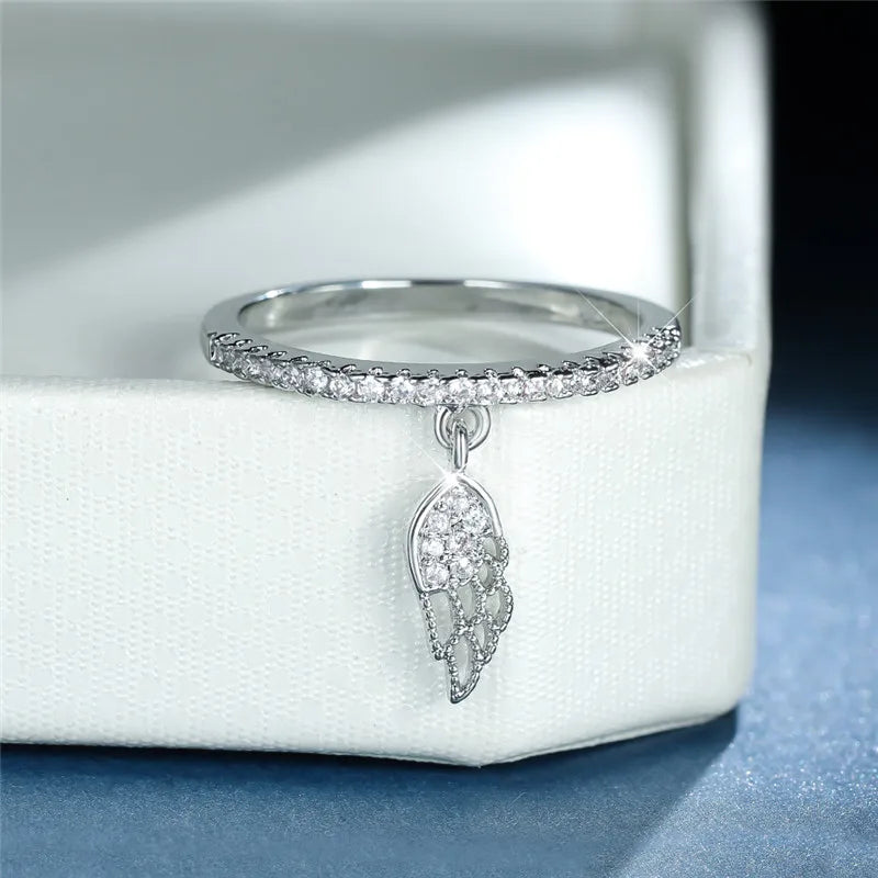 Bague avec pendentif ailes d'ange