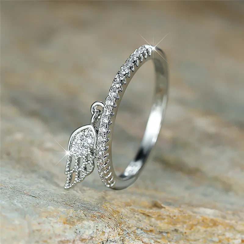 Bague avec pendentif ailes d'ange
