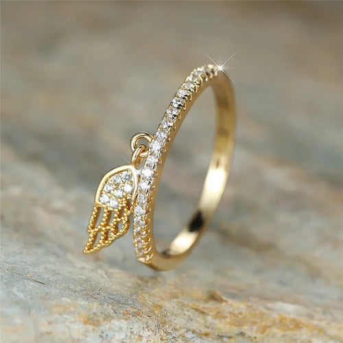 Bague avec pendentif ailes d'ange