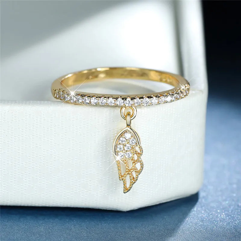 Bague avec pendentif ailes d'ange
