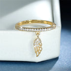Bague avec pendentif ailes d'ange