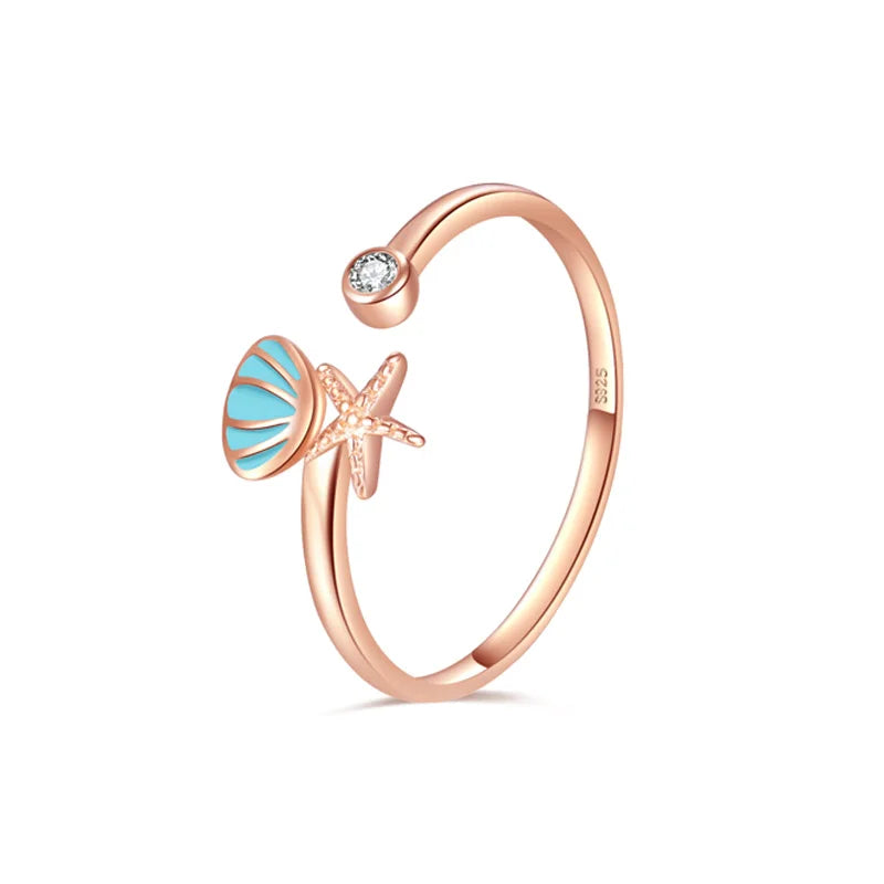 Anillo Conchas Estrella de Mar y Concha de Vieira y Circonio