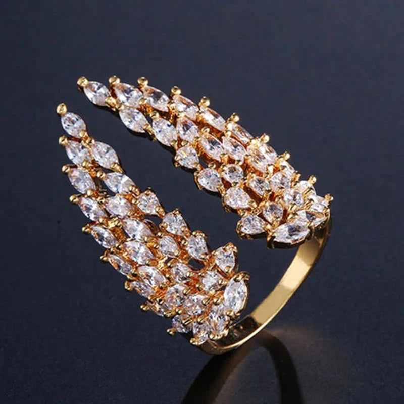 Anillo Pluma en Zirconio oro