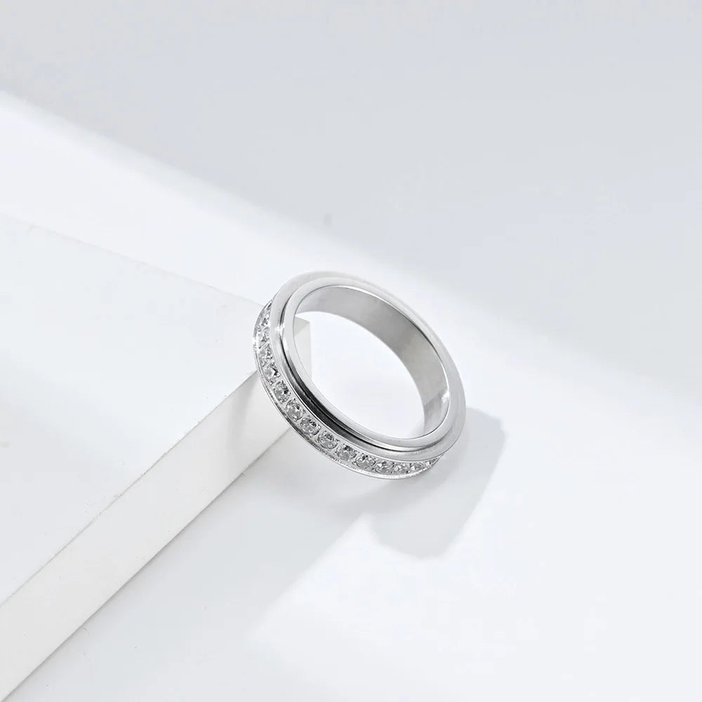 Anillo giratorio antiestrés con circonio