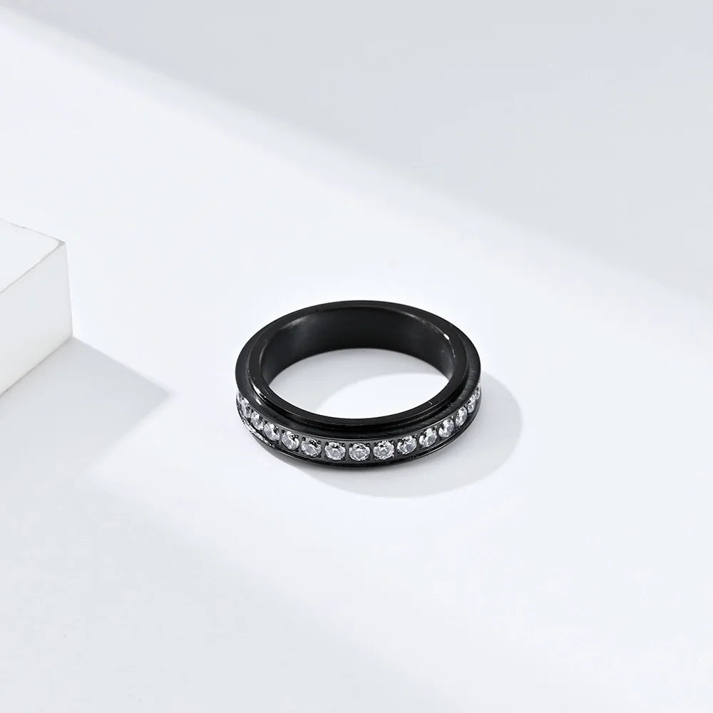 Anillo giratorio antiestrés con circonio
