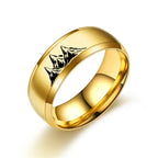 Anillos de colores con montañas doradas