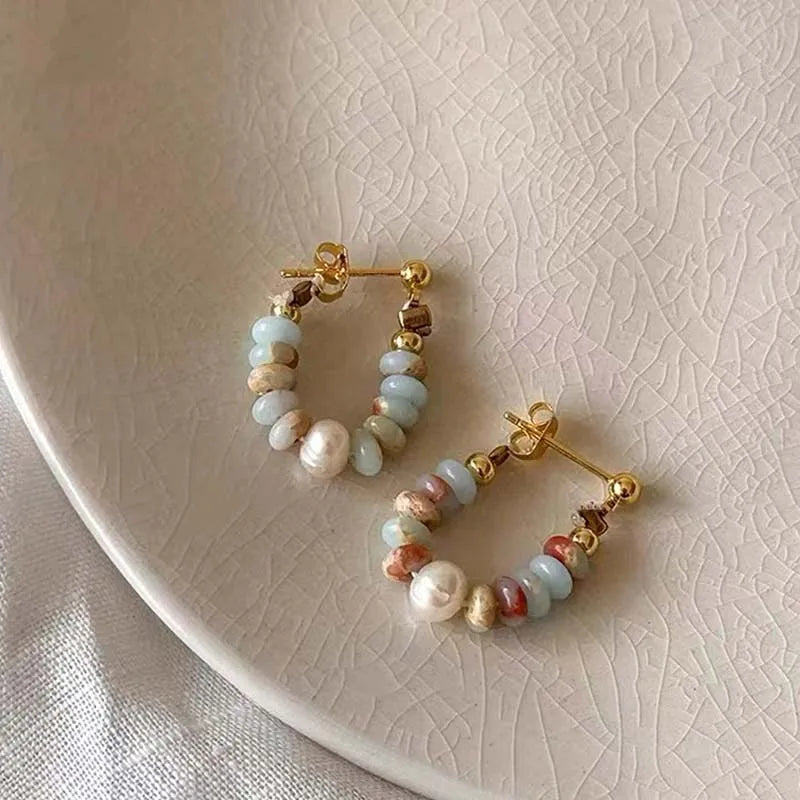 Pendientes de botón con perla y piedras