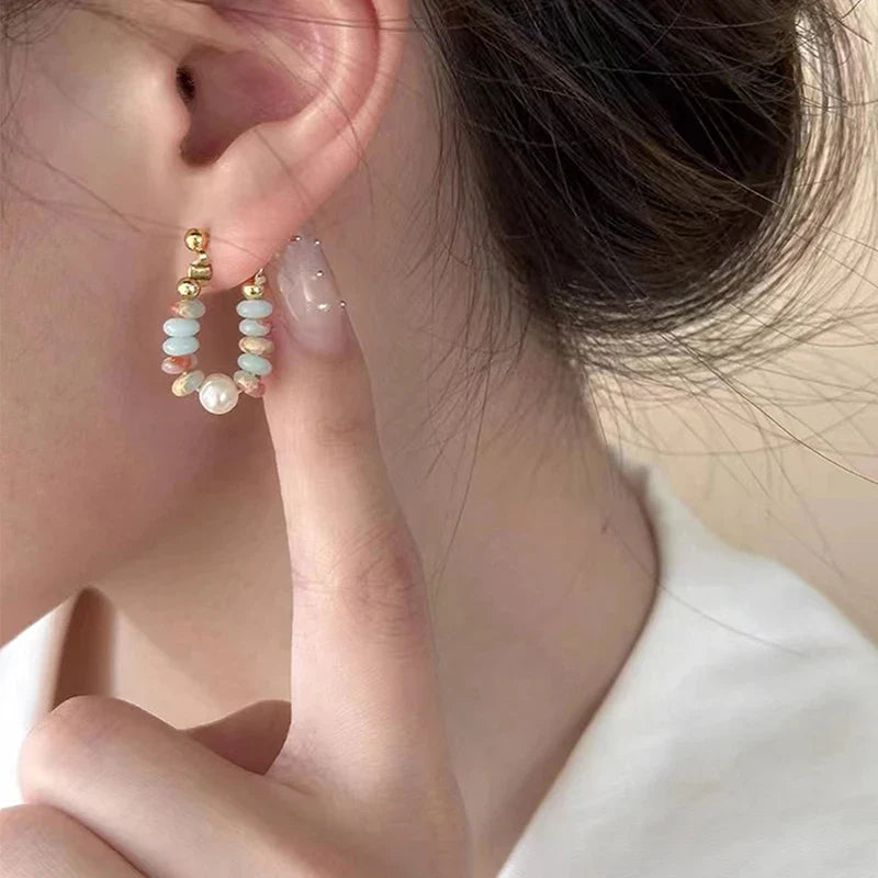 Pendientes de botón con perla y piedras