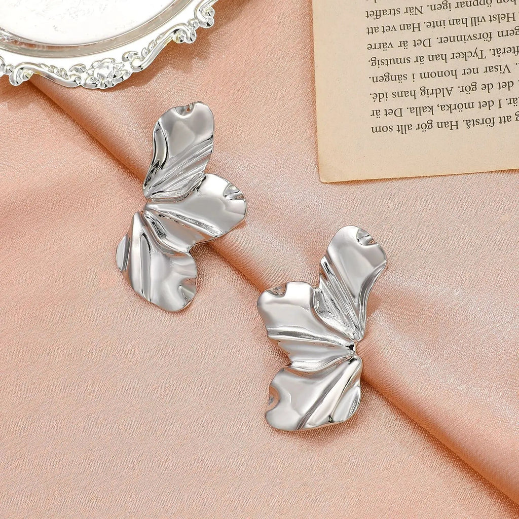 Pendientes de botón Media Flor plata