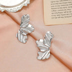 Pendientes de botón Media Flor plata