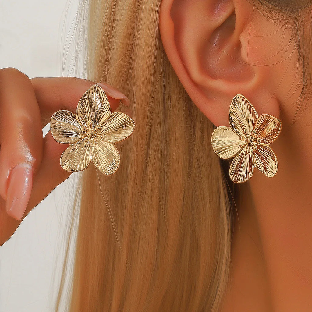 Pendientes de botón flor de cinco pétalos oro