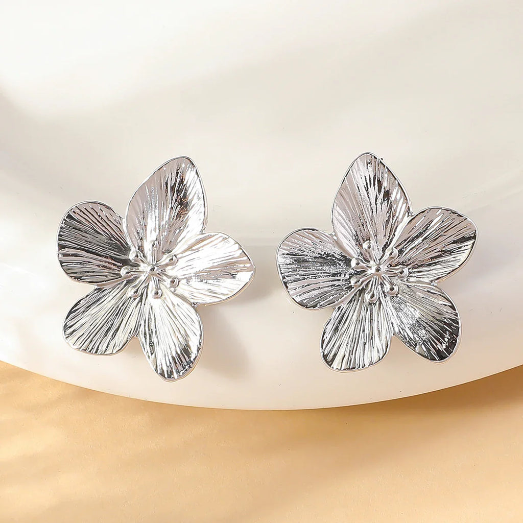 Pendientes de botón flor de cinco pétalos plata