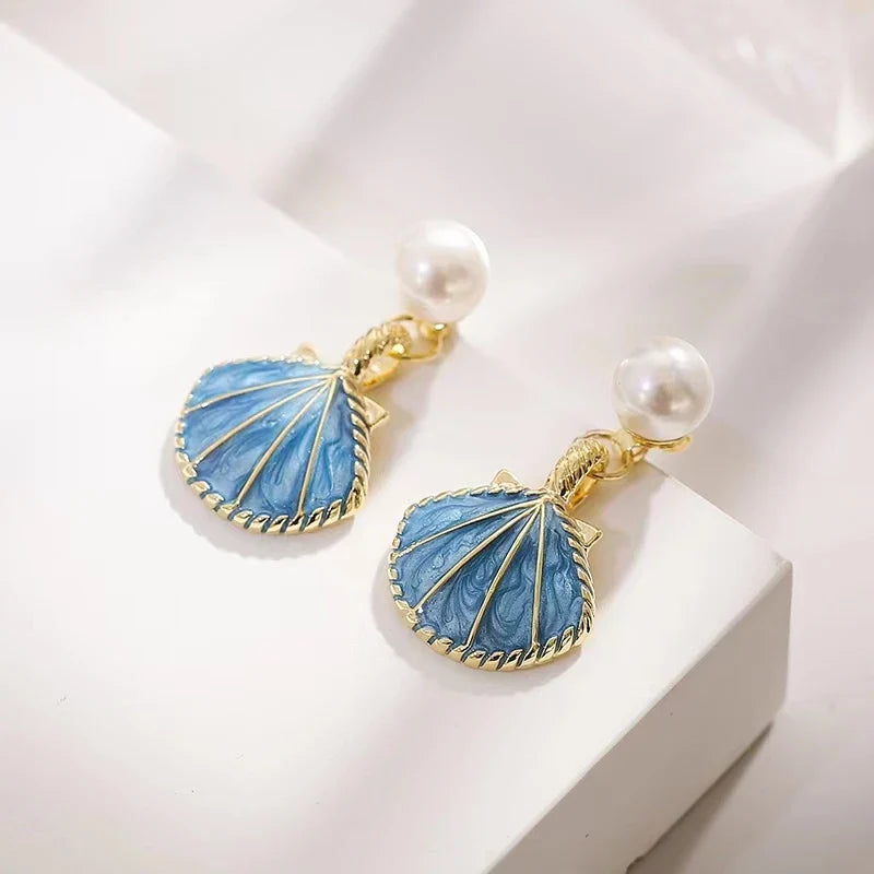 Pendientes con Conchas de Vieira Azules Concha