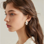 Pendientes de Media Flor Clavo Pétalos blancos