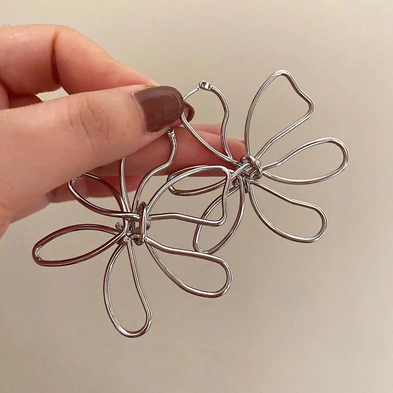 Pendientes de Flor Clavo Vintage Asimétricos plata