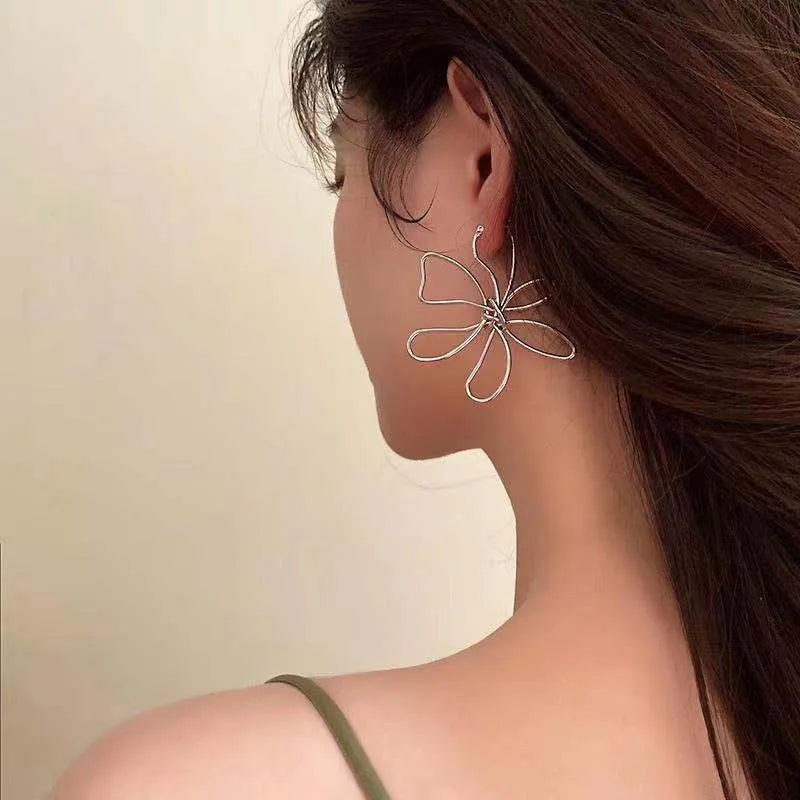 Pendientes de Flor Clavo Vintage Asimétricos plata