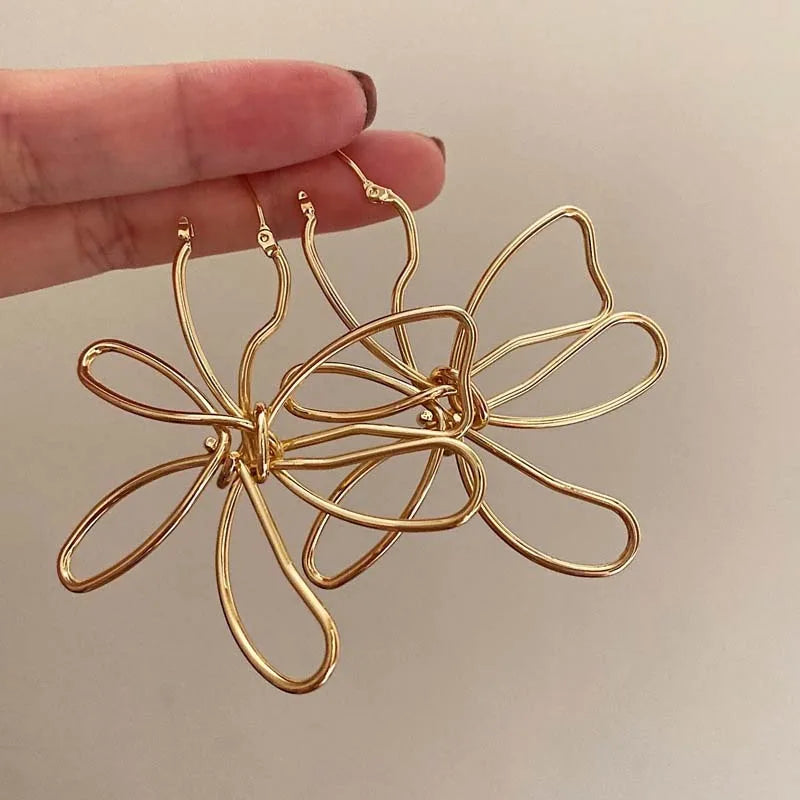 Pendientes de Flor Clavo Vintage Asimétricos oro