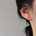 Boucles d'oreilles minimalistes noeud papillon