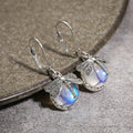 Pendientes Colgantes de Mariposa y Piedra de Luna