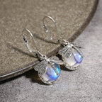 Pendientes Colgantes de Mariposa y Piedra de Luna