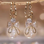 Pendientes Colgantes con Lazo de Mariposa y Perla