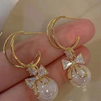Pendientes Colgantes con Lazo de Mariposa y Perla