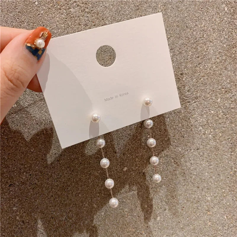 Pendientes Colgantes con Perlas Blancas