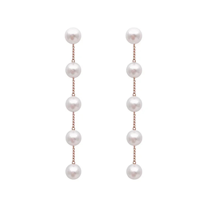 Pendientes Colgantes con Perlas Blancas