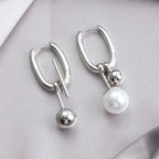 Pendientes Aros Estilizados con Perlas