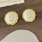 Boucles d'oreilles rondes clef