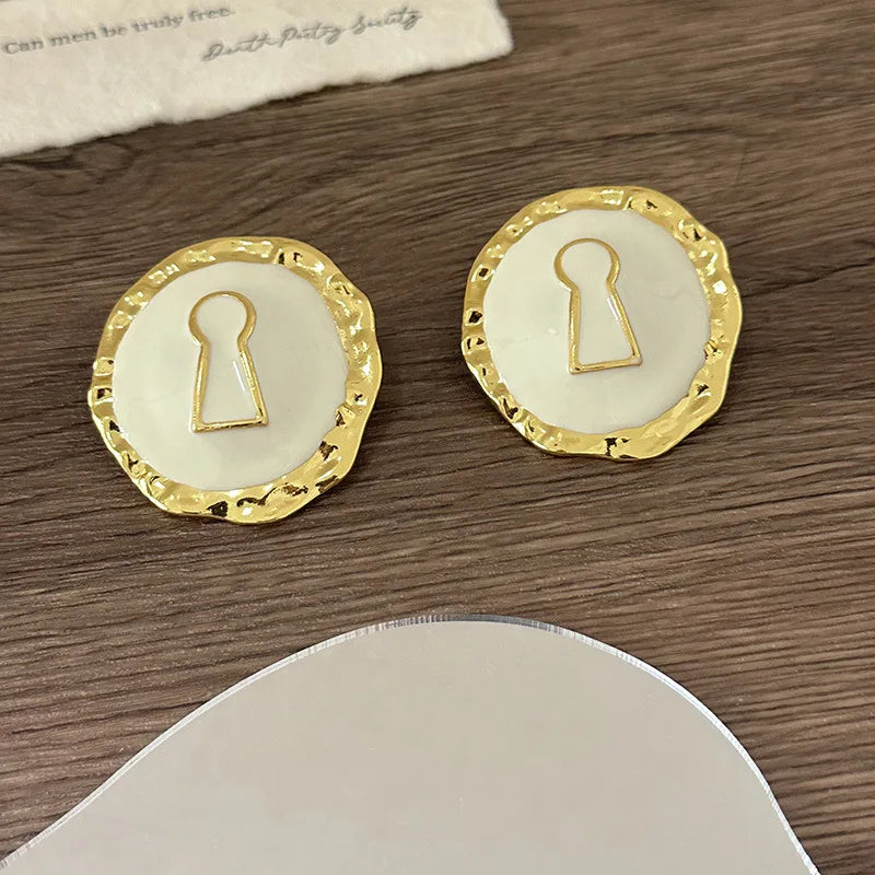 Boucles d'oreilles rondes clef