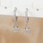 Boucles d'oreilles rondes clef et cadenas avec strass