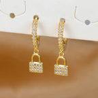Boucles d'oreilles rondes clef et cadenas avec strass