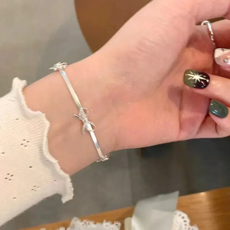 Bracelet avec noeud papillon pour femme
