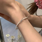 Bracelet avec noeud papillon pour femme