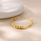 Pulsera con Perlas Giratorias Antiestrés para Hombre o Mujer oro