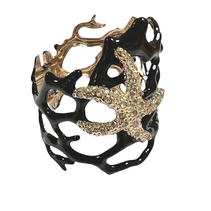 Pulsera Coral y Estrella de Mar negra