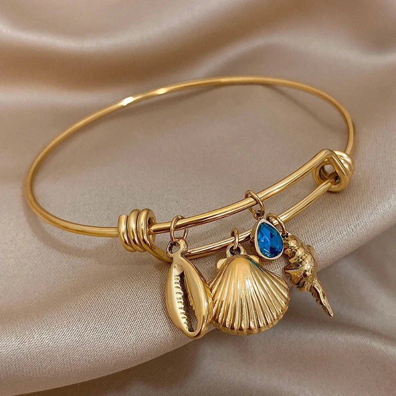 Pulsera de Encanto con Conchas dorada